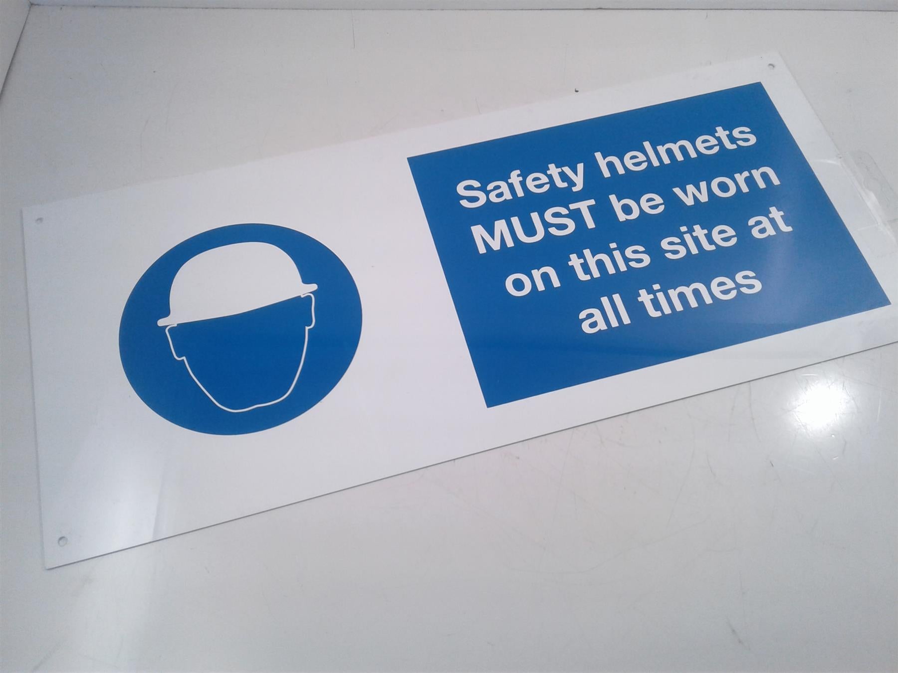 Safety Helmets (double-sided) rigid sign 450 x 200mm