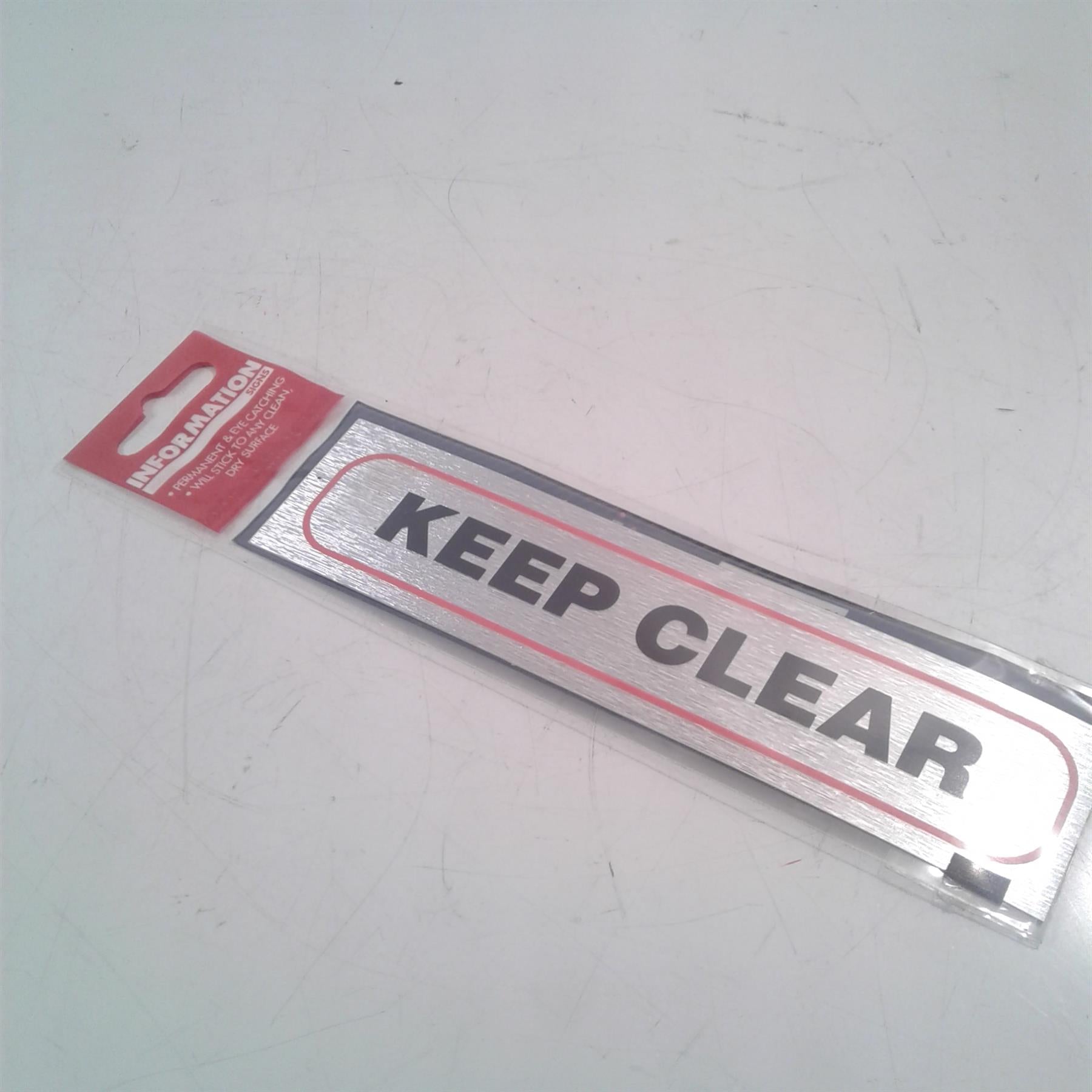 Keep Clear - Brushed Metallic Adhesive Sign