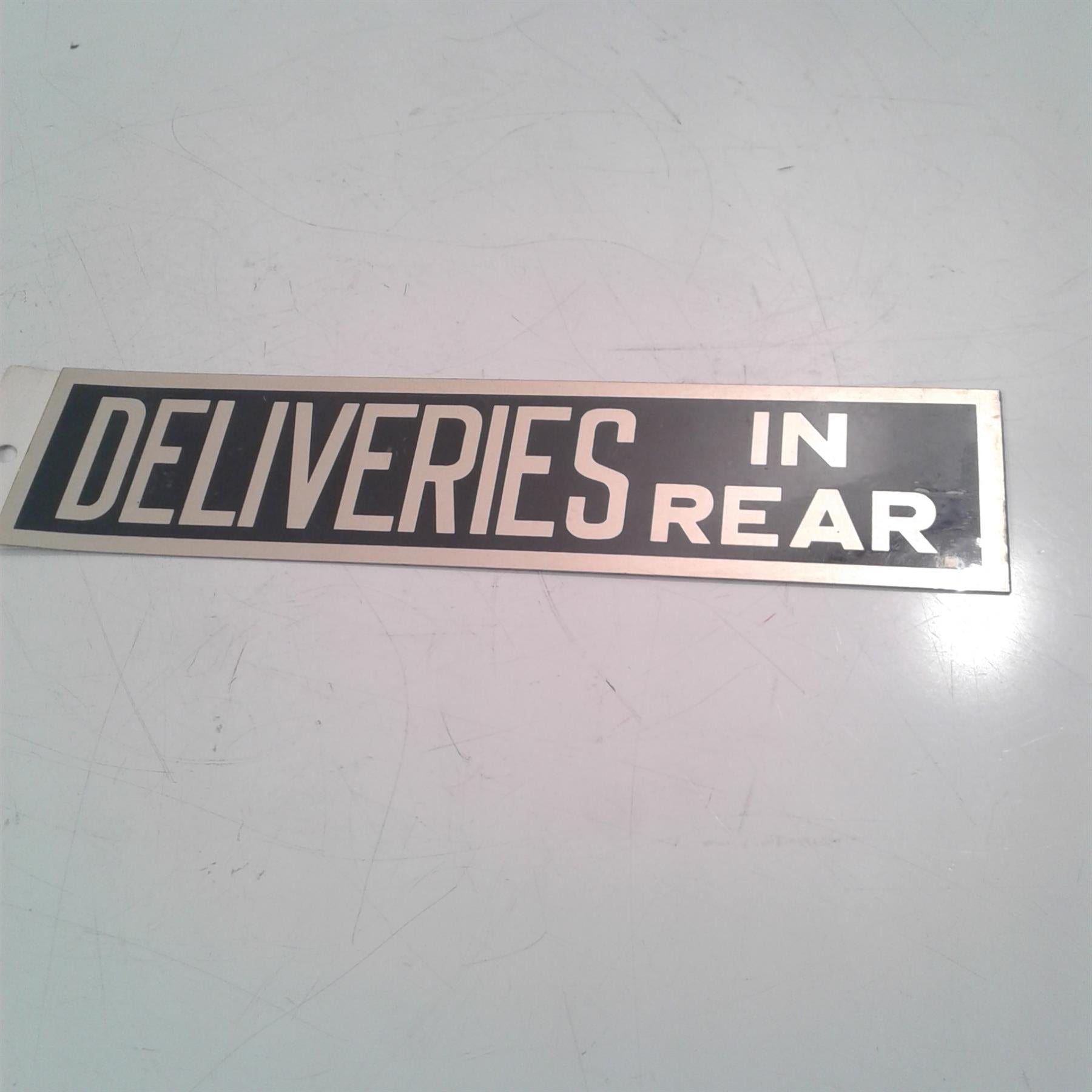 Deliveries in Rear Rigid Sign