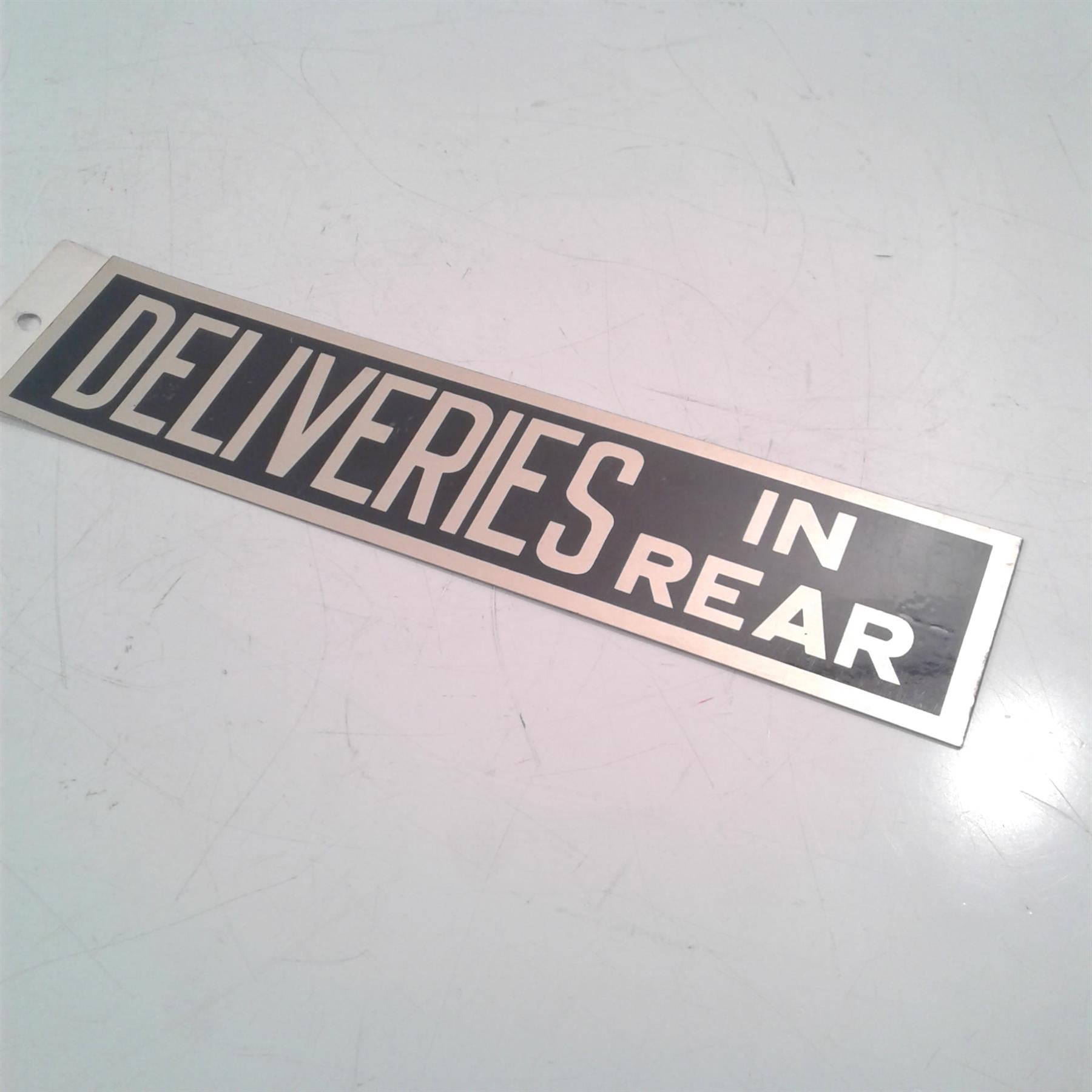 Deliveries in Rear Rigid Sign
