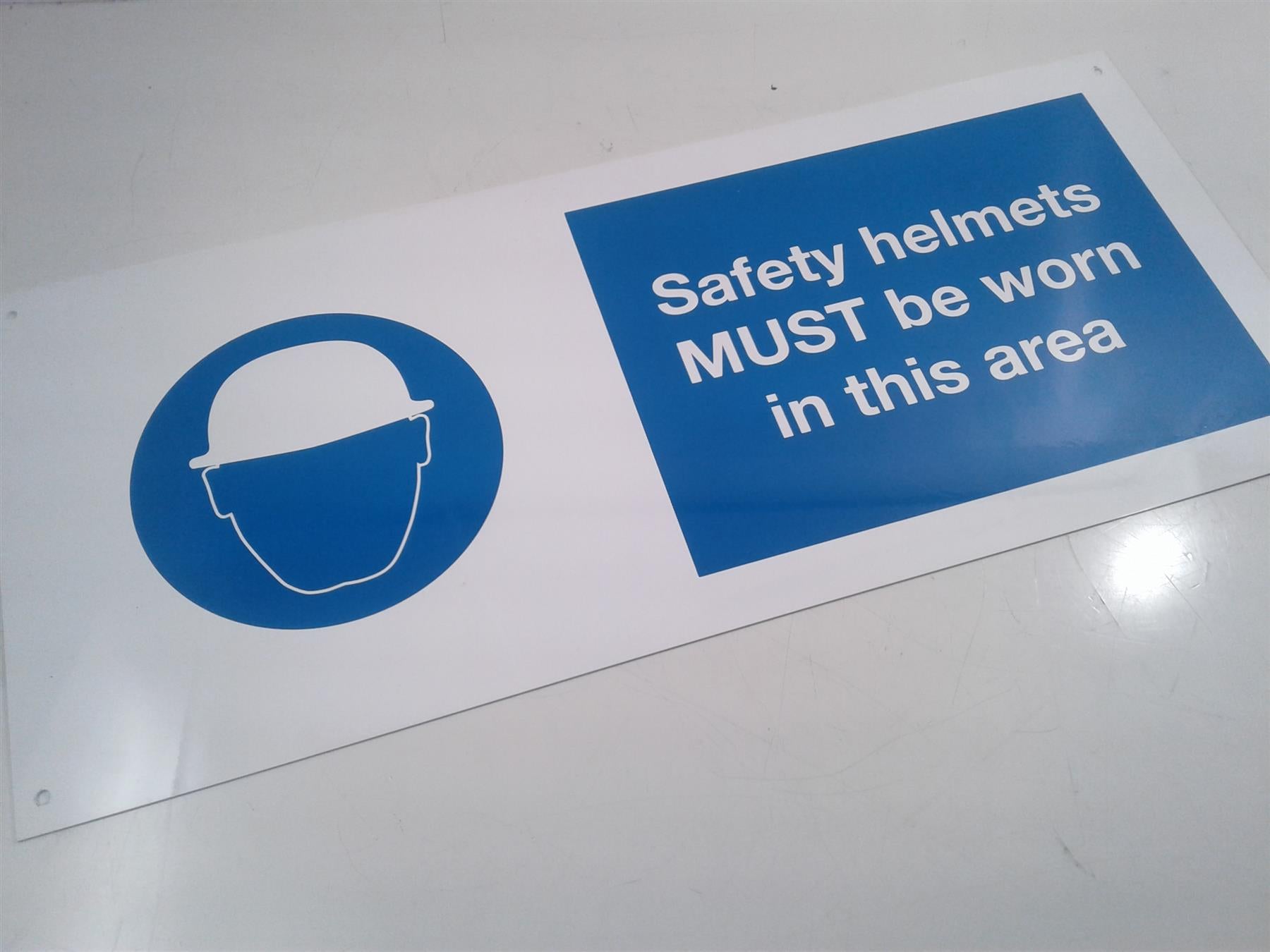 Safety Helmets (double-sided) rigid sign 450 x 200mm