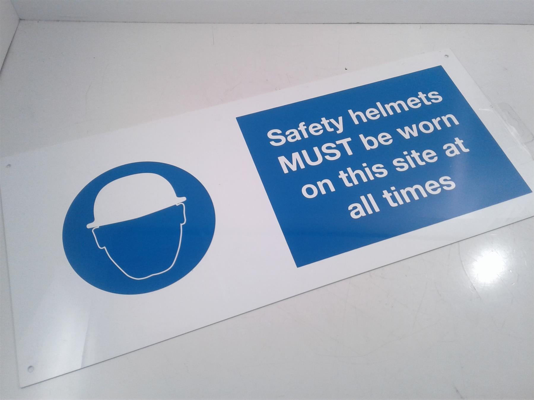 Safety Helmets (double-sided) rigid sign 450 x 200mm
